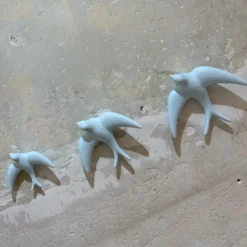 Trio of Light Blue Swallows