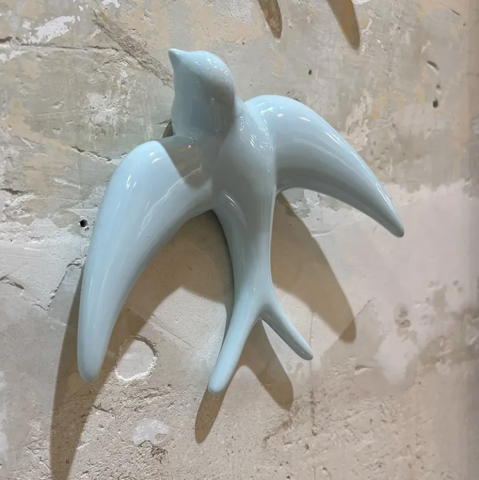 Trio of Light Blue Swallows