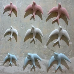 Trio of Light Blue Swallows